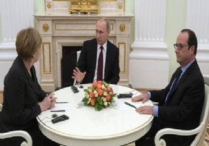 Putin, Merkel ve Hollande Kremlin de Bulutu