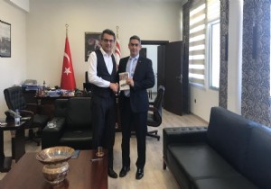 KKTC Babakan Erhrman Yazar Turgl Tomgsehan  Kabul etti